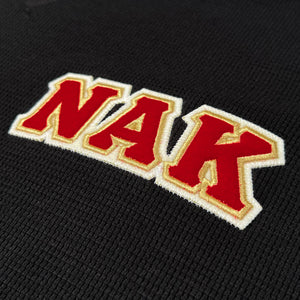 NU ALPHA KAPPA NEW ERA® THERMAL LONG SLEEVE BLACK